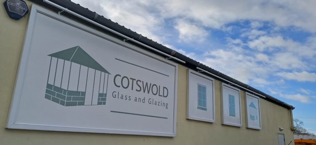 Cotswold Glass and Glazing exterior with conservatory and window displays.